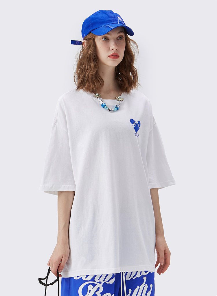 "PRETENDING TO BE HAPPY" T-SHIRT